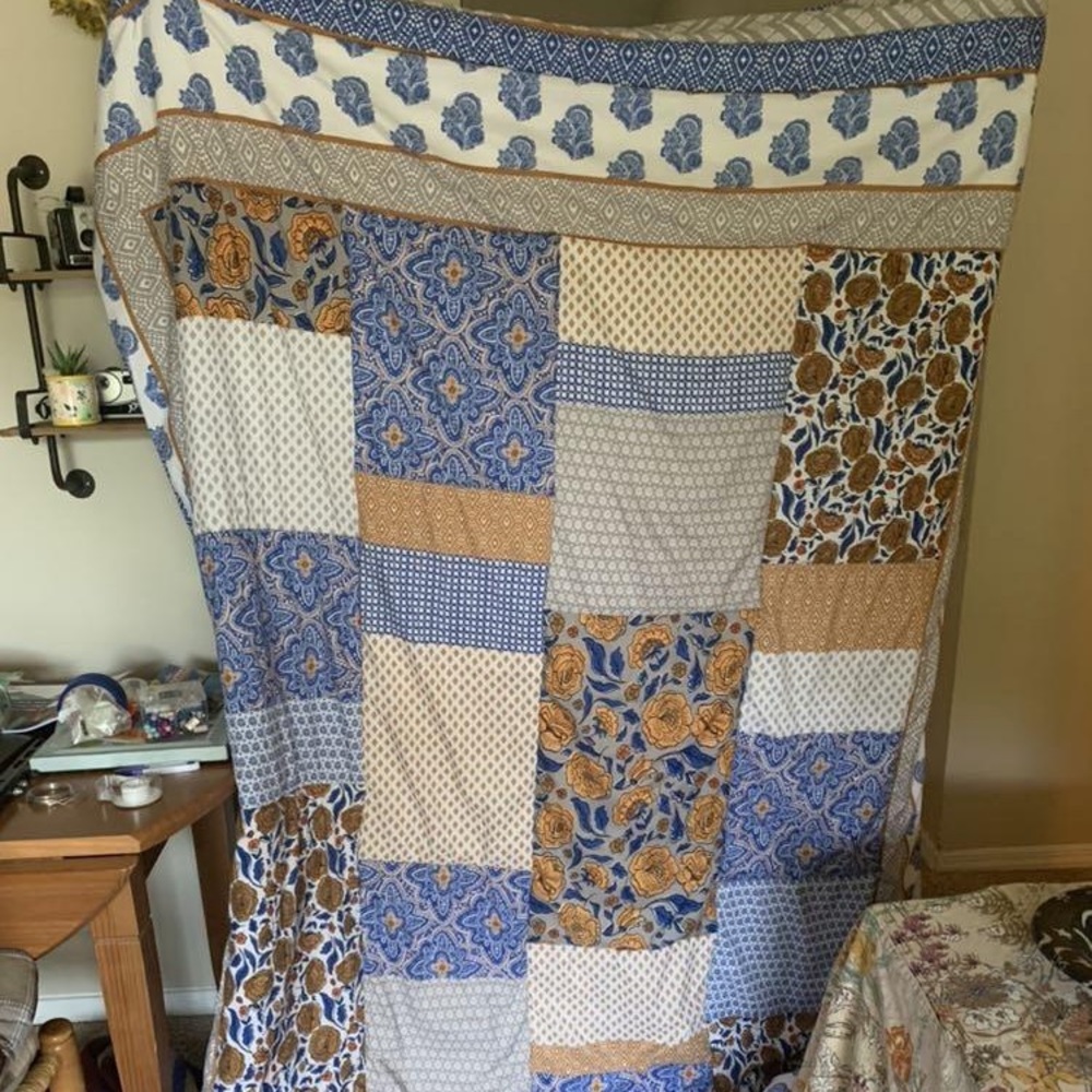 Blue and gold reversible comforter